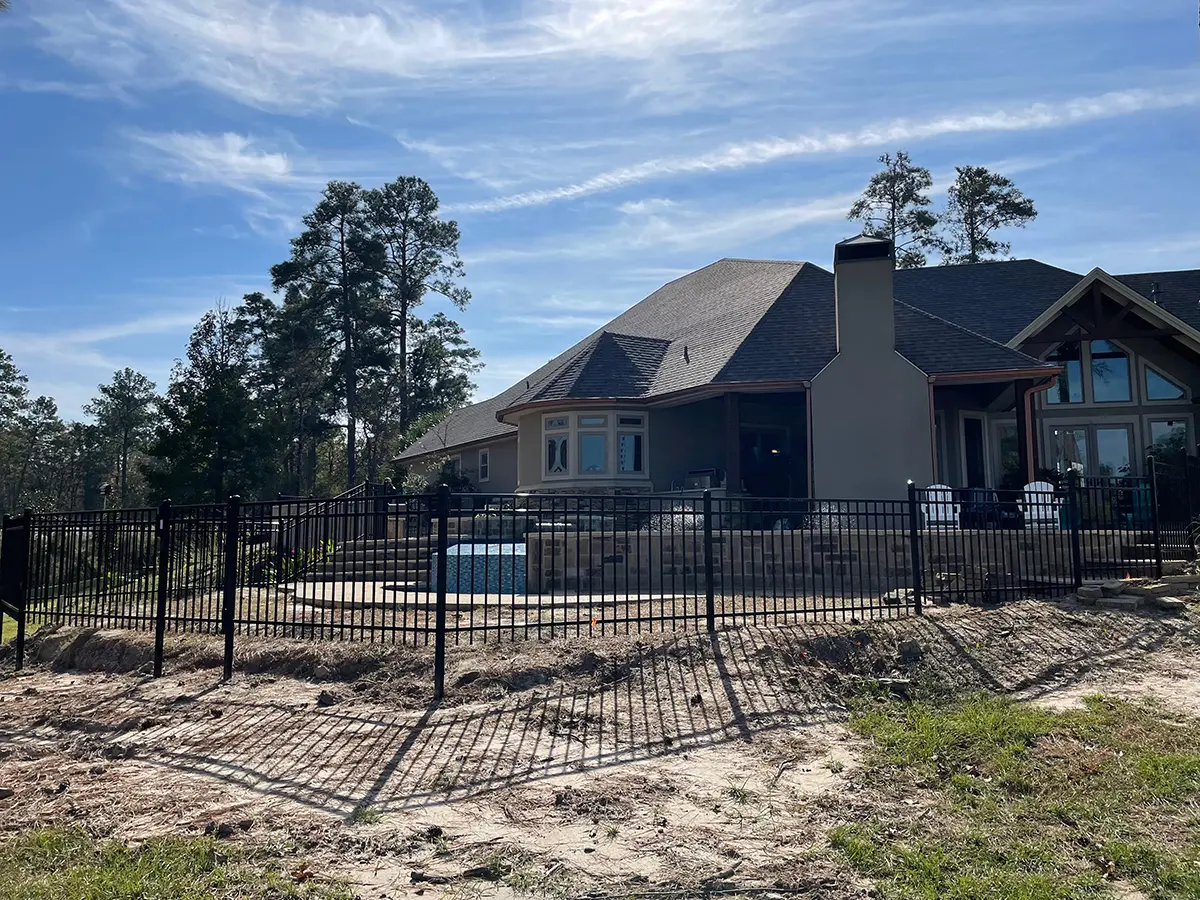 Black Aluminum Pool Fence with Stonework