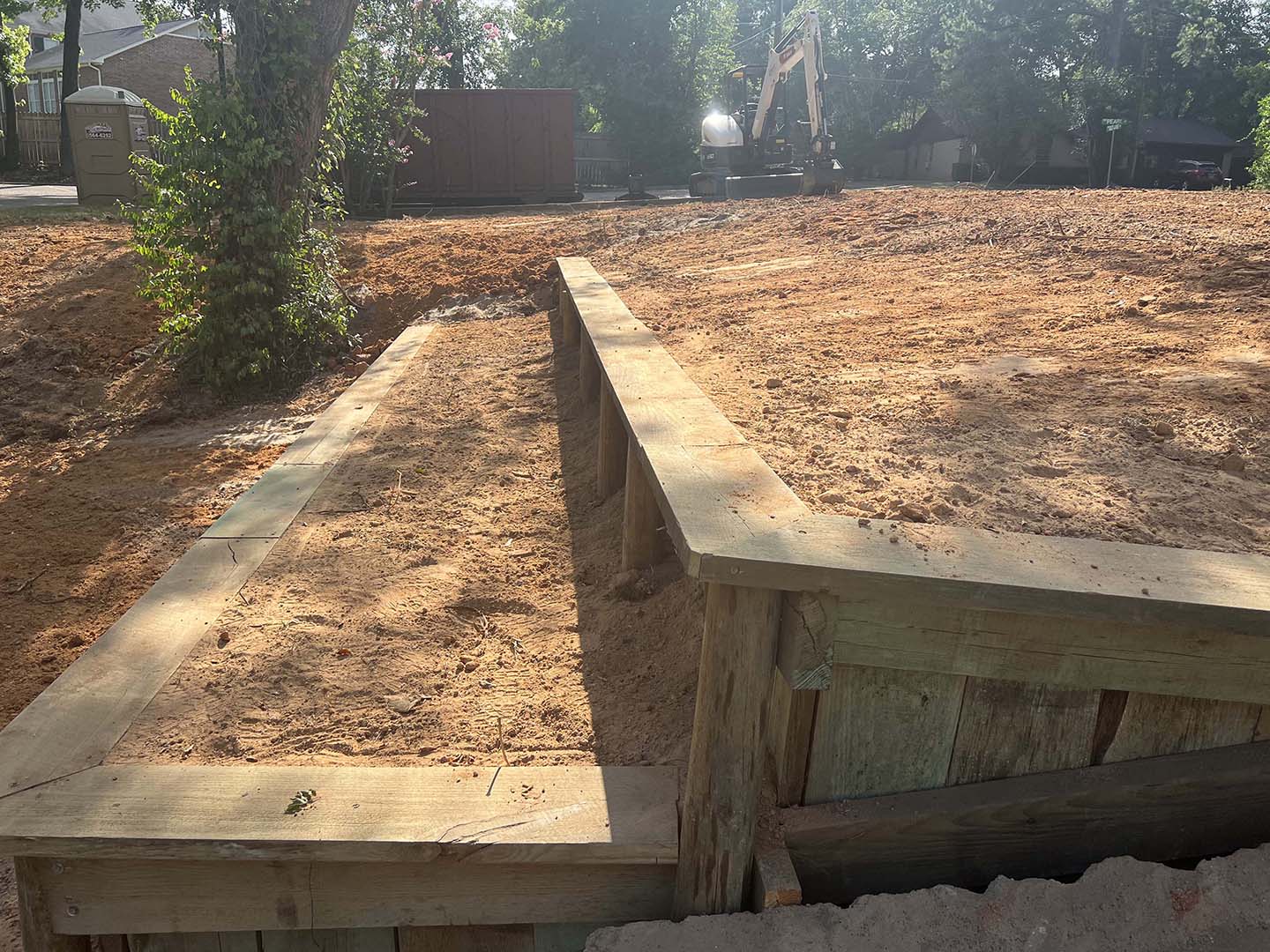 East Texas Residential Wood Retaining Wall on Hillside