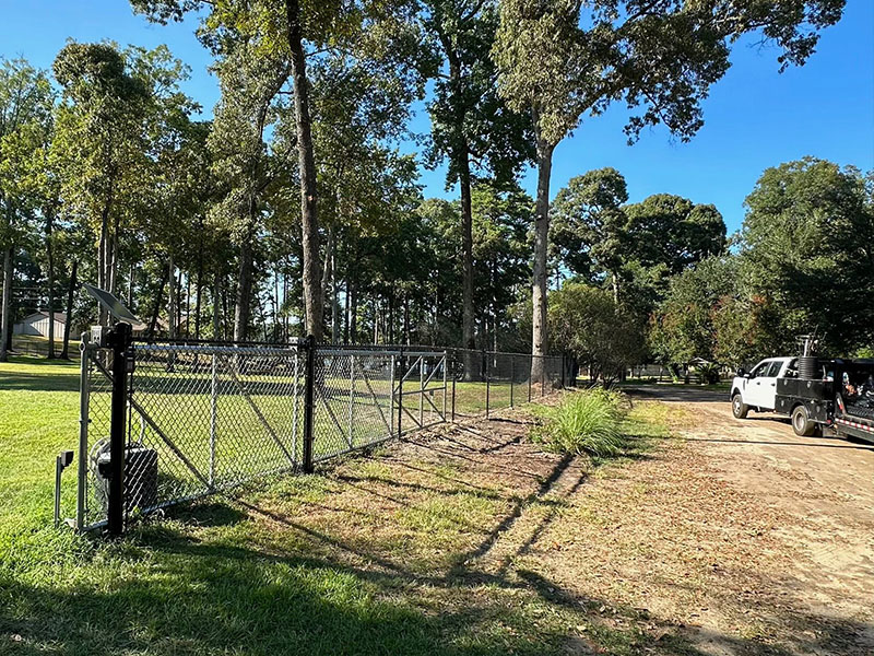 Galvanized chain link fence with automated cantilever gate in Lufkin Texas
