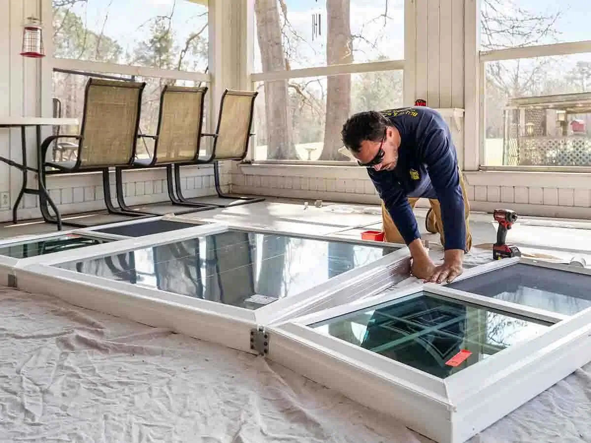 Blume & Son Construction installing new vinyl windows on a home