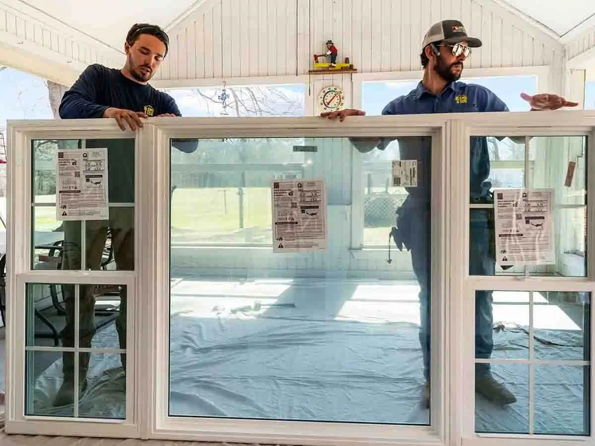 Installing vinyl windows onto a home in Lufkin Texas