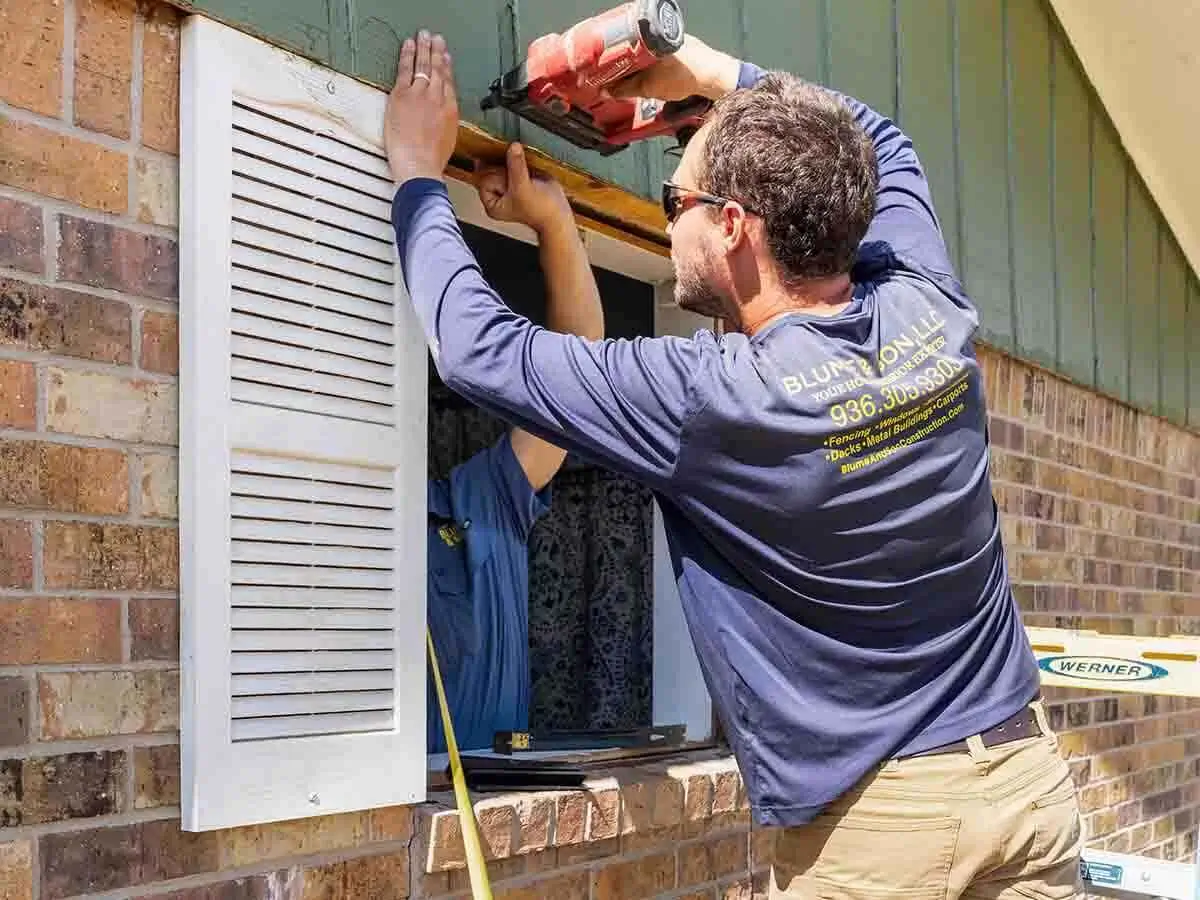 Blume & Son Construction removing windows so they can install new ones