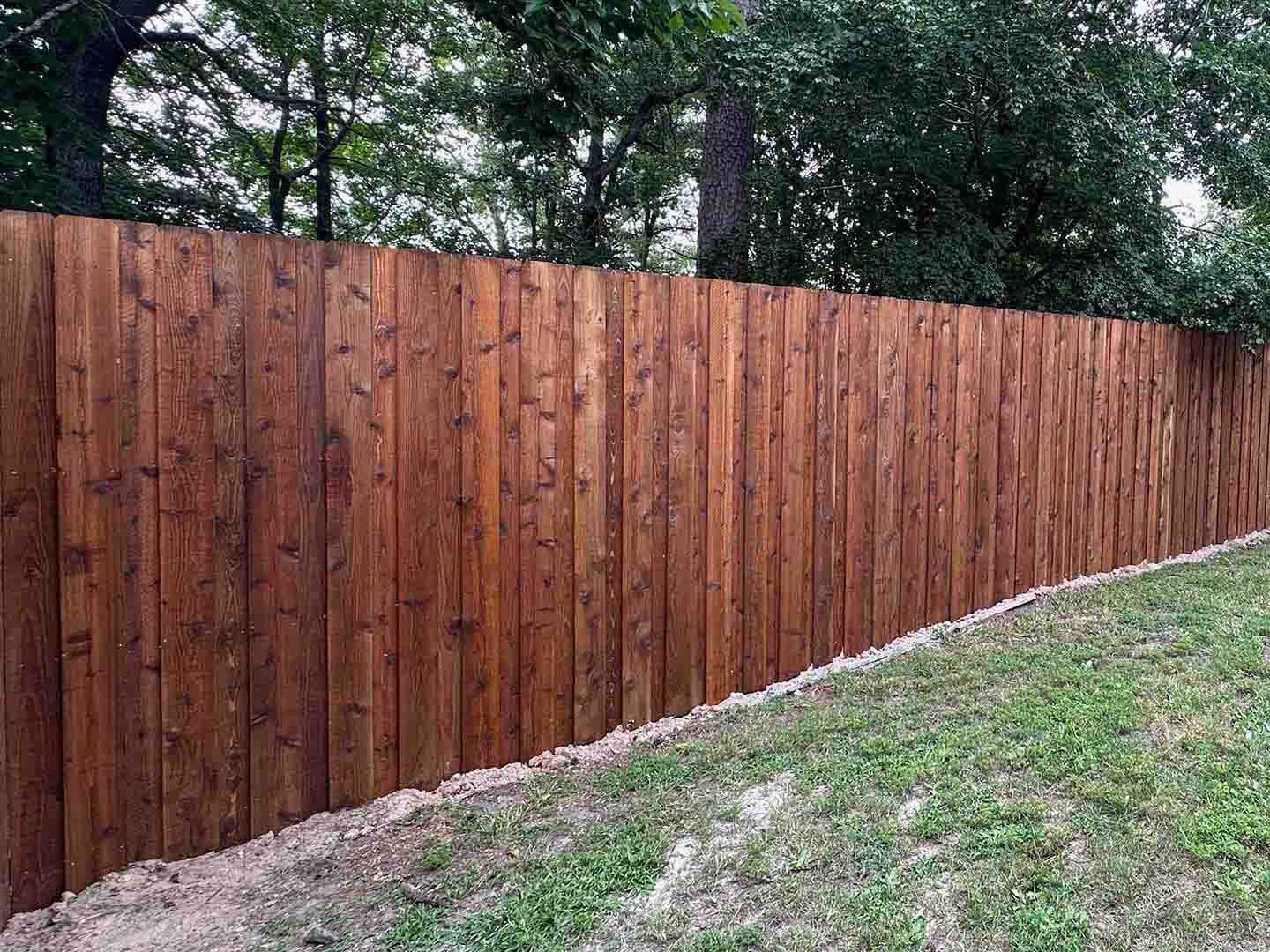 Full Privacy Wood Fence With Custom Stain for Homes or Businesses in Lufkin Texas